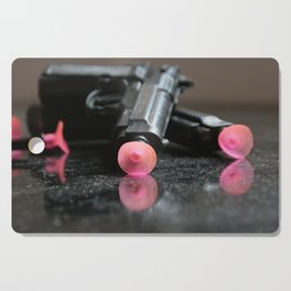 toy plastic guns Cutting Board