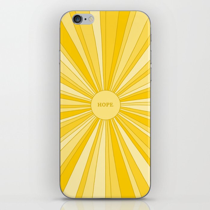 Retro sun with rays in gold and yellow + HOPE iPhone Skin