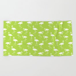 White flamingo silhouettes seamless pattern on apple green background Beach Towel
