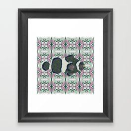 Clownfish swimming on a green and pink patterned background Framed Art Print