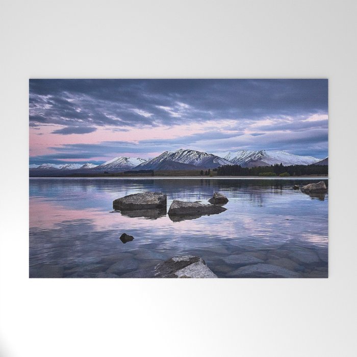 New Zealand Photography - Stones In The Water Under The Cloudy Pink Sky Welcome Mat