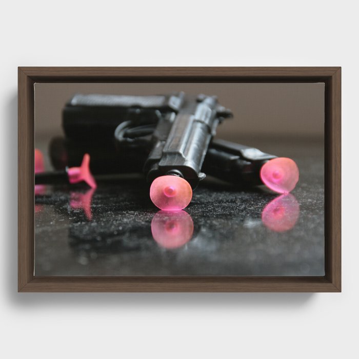 toy plastic guns Framed Canvas