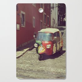 Tuk tuk taxi in Lisbon, Portugal | Alfama district  Cutting Board