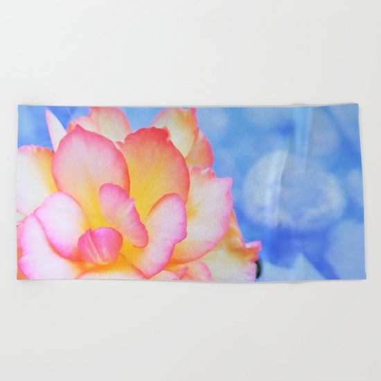 begonie on blue water Beach Towel