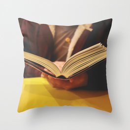 Man reading a book Throw Pillow