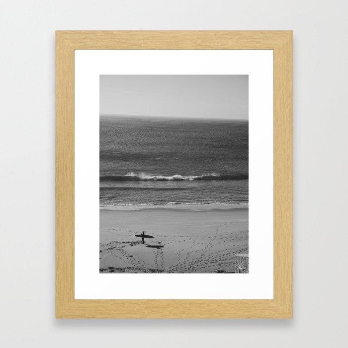 Surfer looking for waves Framed Art Print