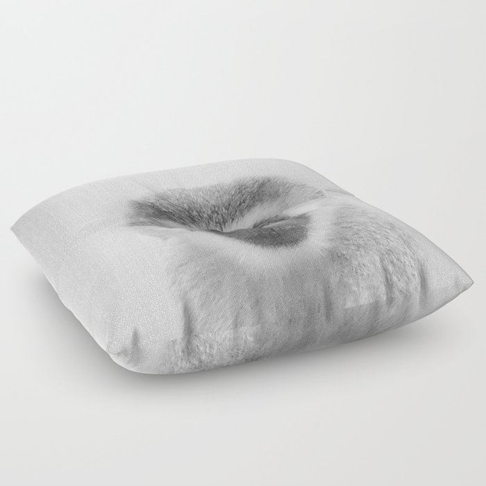 Black and store white floor pillow