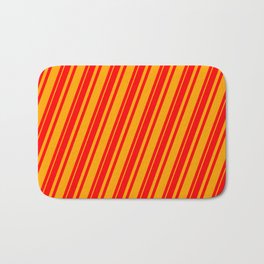 [ Thumbnail: Red & Orange Colored Pattern of Stripes Bath Mat ]