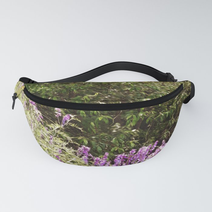 Magic spring forest landscape with purple wildflowers blossom Fanny Pack