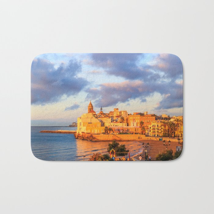 View of Sitges, Spain basking in the early morning sunshine Bath Mat