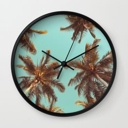 Tropical palm tree with blue sky and cloud abstract background. Summer vacation and nature travel adventure concept. Pastel tone filter effect color style.  Wall Clock