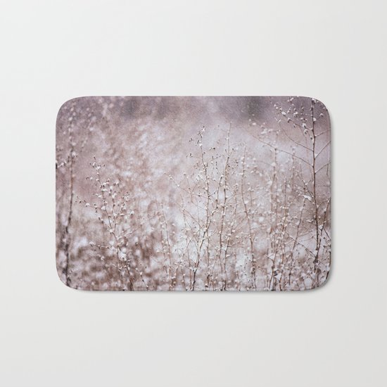 Snowy branches in the rain Bath Mat
