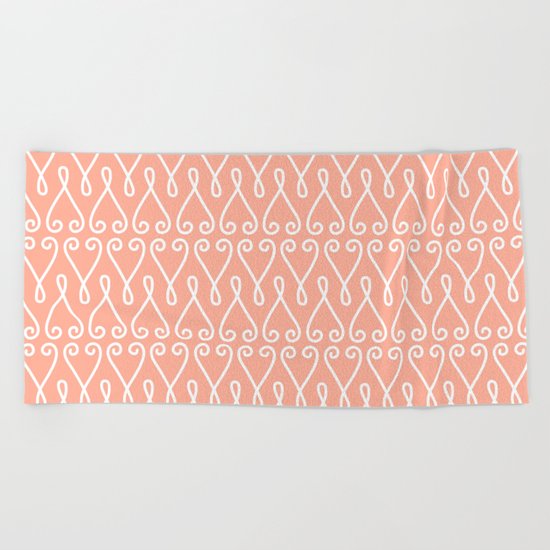 White Ornamental Designs on Pink Background Beach Towel