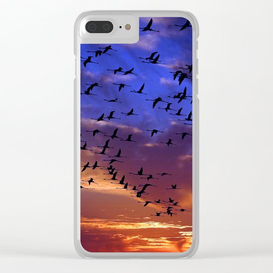 Flight of flamingos at sunset Clear iPhone Case