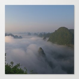 China Photography - Tall Mountains Reaching Over The Clouds In The Sunset Canvas Print