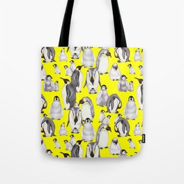 Bright yellow joyful penguins family Tote Bag