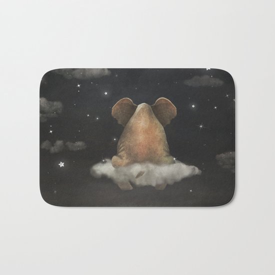 Sad elephant sitting on cloud in night sky Bath Mat