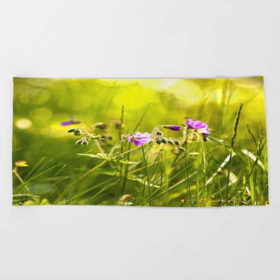 Beautiful meadow flowers - geranium on a sunny day - brilliant bright colors Beach Towel