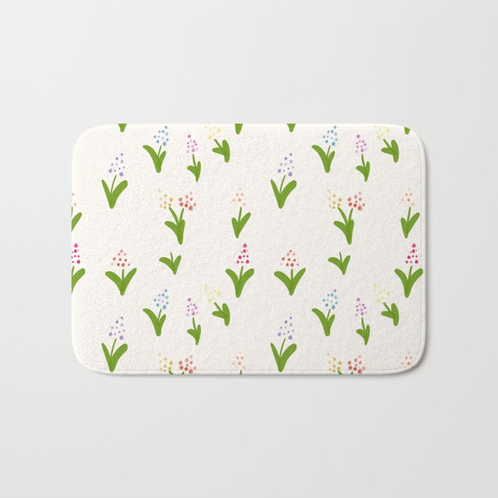 Tiny flowers in bloom Bath Mat