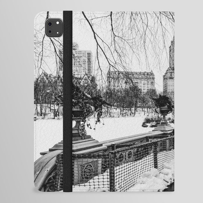 Central Park Bow Bridge in New York City during winter snowstorm blizzard black and white iPad Folio Case