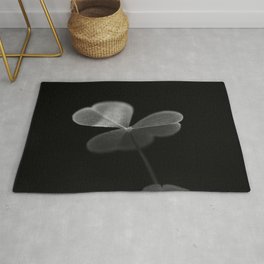 Oxalis in black and white Rug