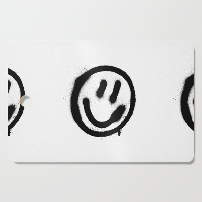 graffiti smiling face emoticon in black on white Cutting Board