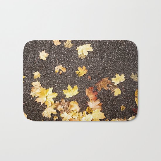 Gold yellow maple leaves autumn asphalt road Bath Mat