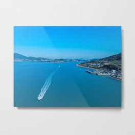 A drone shot of a motorboat running on the sea in Dunbyeong Island, Goheung, South Korea’s southern coast,Korea Metal Print