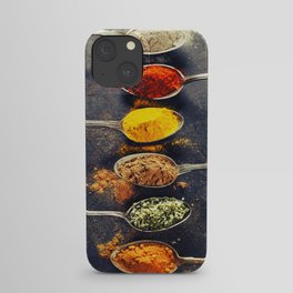 Colorful spices in metal spoons iPhone Case