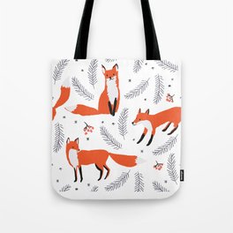 Red foxes and berries in the winter forest Tote Bag