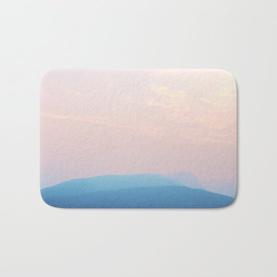 Pastel sunset over the mountains Bath Mat