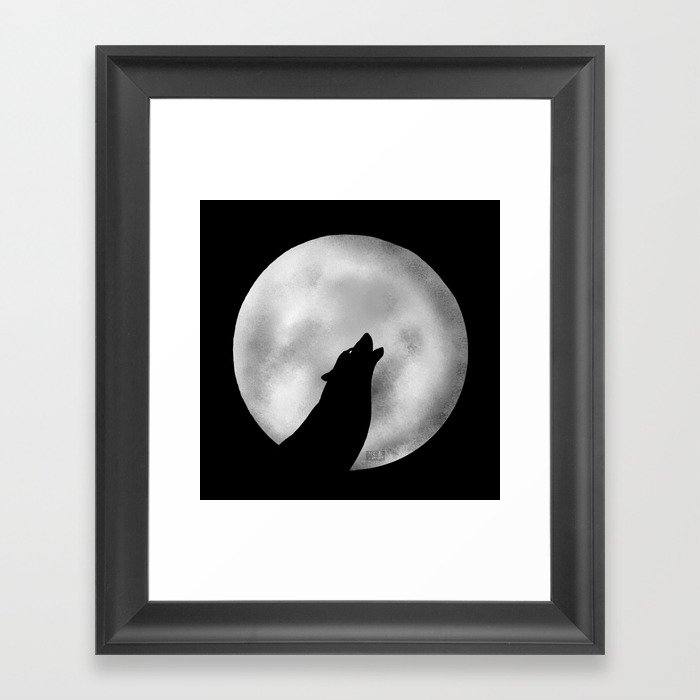 Howling at the moon -wolf silhouette Framed Art Print