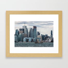 A ship carries tourists from Algonquin Island to the Old Toronto Framed Art Print