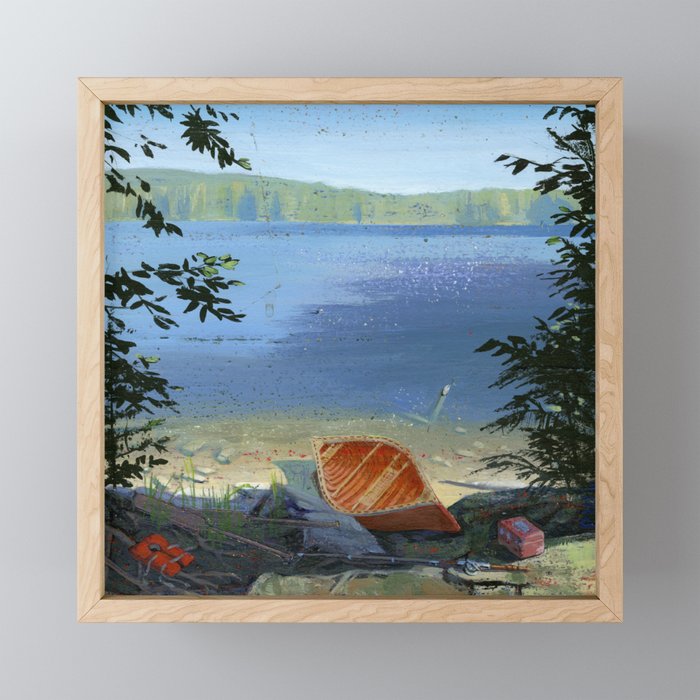 canoe on shore Framed Mini Art Print