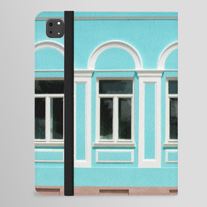  Old city, Prettily suburban town. Architectural details and decoration of the vintage stucco facade framing the windows - console, protome, mascaron, capital, pilasters, wreaths, relief and other.  iPad Folio Case
