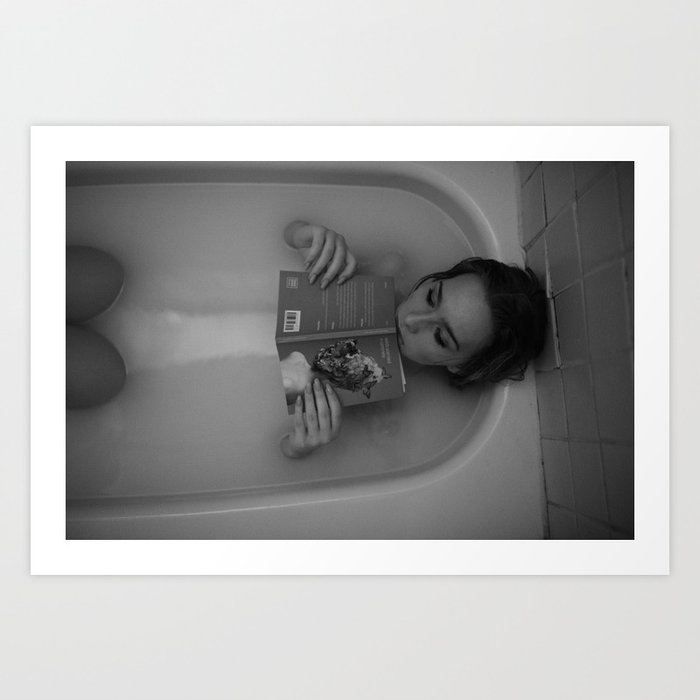 Rom-com; young woman reading Romance novel in the bathtub lost in contemplation black and white photograph Art Print
