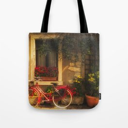 Red Bicycle in front of a Window with flowers Tote Bag