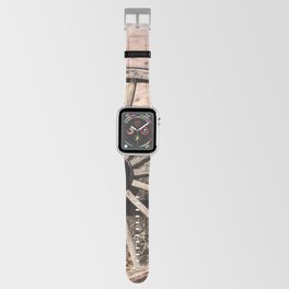 Old wagon wheel against a fence Apple Watch Band