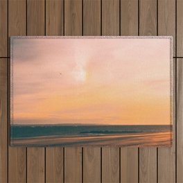 Pink yellow sunset at the beach Outdoor Rug