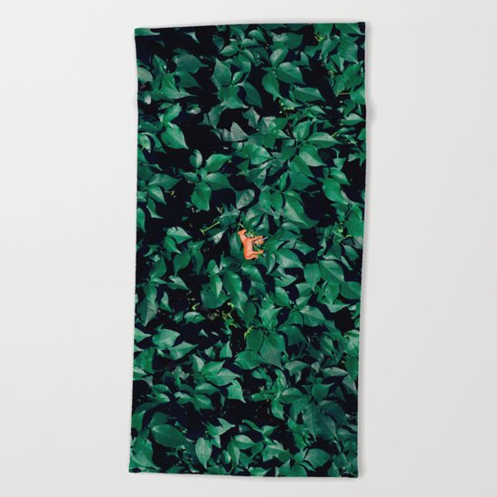 Orange horse in the bush Beach Towel