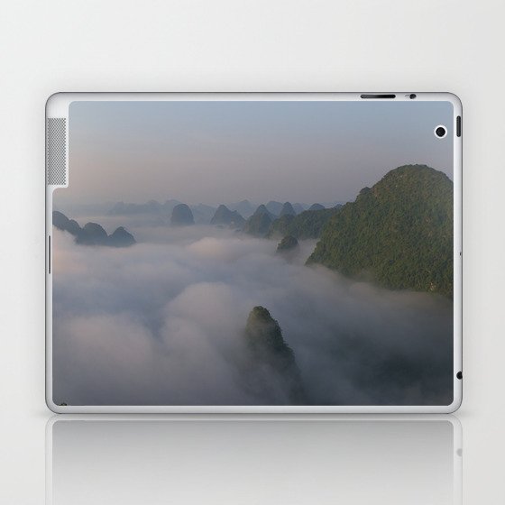 China Photography - Tall Mountains Reaching Over The Clouds In The Sunset Laptop & iPad Skin