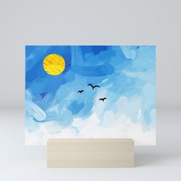 a flight of swallows in a beautiful blue sky Mini Art Print