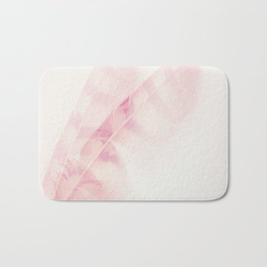 Pink feathers on a soft pastel background - beautiful and dreamy Bath Mat