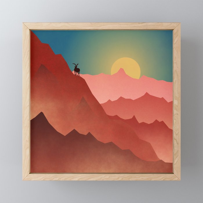 Goat in a mountain Framed Mini Art Print