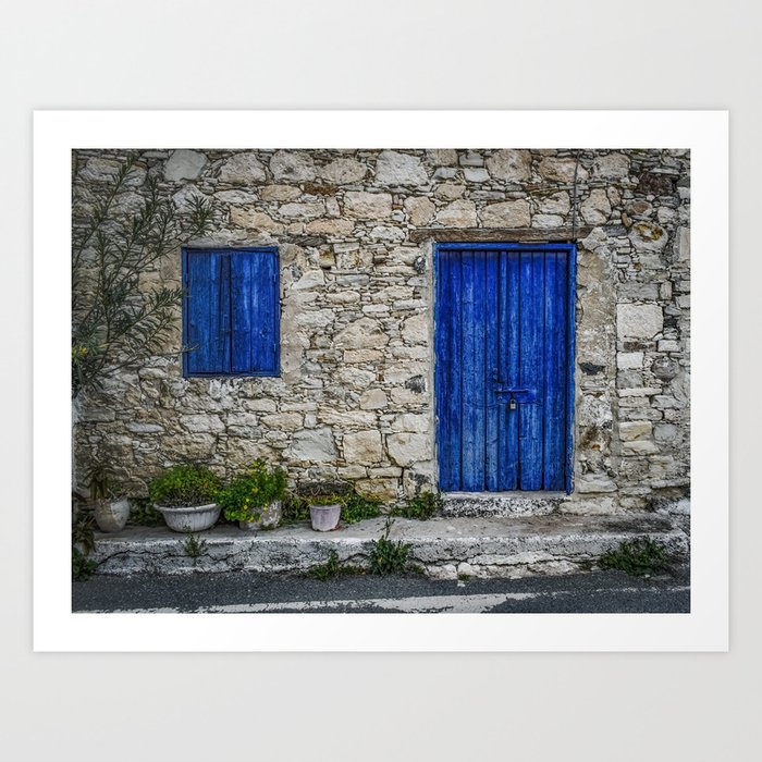 Beautiful rustic navy blue door and window facade of fieldstone old world house color photograph art print Art Print