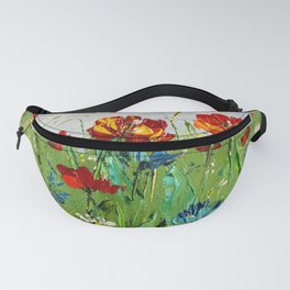Red poppies and blue cornflowers in a green field Fanny Pack