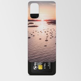 Dramatic sunset on the sea coast with boats in the sea Android Card Case