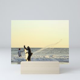 Fishermen on the beach in Bali Mini Art Print