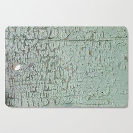 Part of wood with peeled green paint, abstract texture Cutting Board