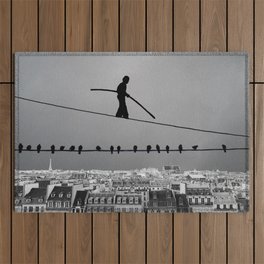 Man on Wire Outdoor Rug